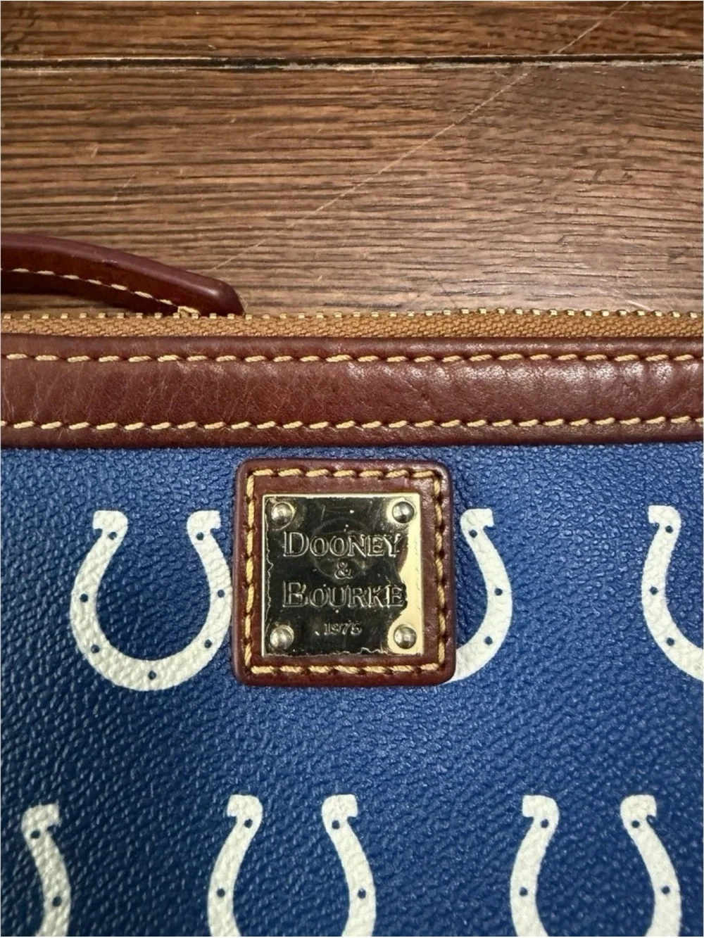 Dooney & Bourke Blue Horseshoe Print Wristlet with Brown Trim